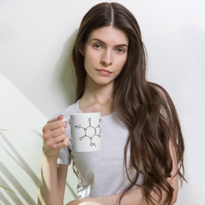 Woman holding a caffeine molecule mug