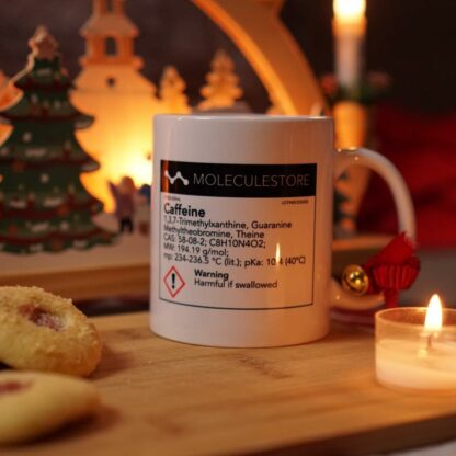 Caffeine mug with chemical label with Christmas decoration