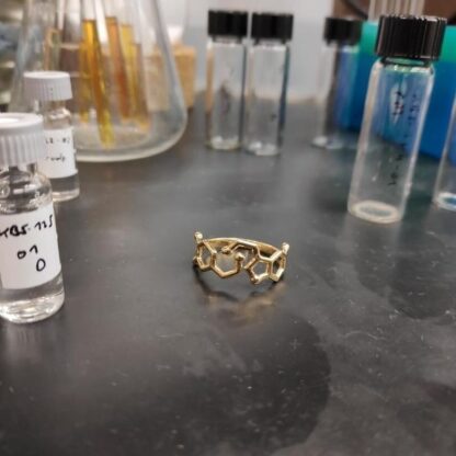 Serotonin & dopamine molecule ring on a lab table