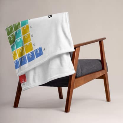 Periodic Table of Elements blanket folded over chair
