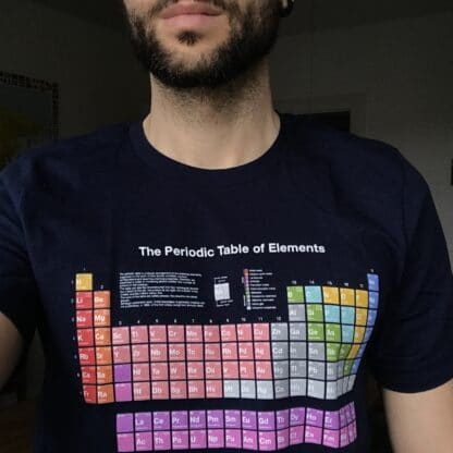 Male model wearing a periodic table t-shirt
