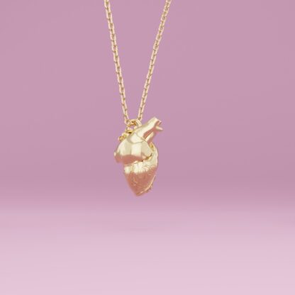 Anatomical heart necklace gold side